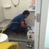 Drain cleaning services for a sink and floor drains in a restroom.